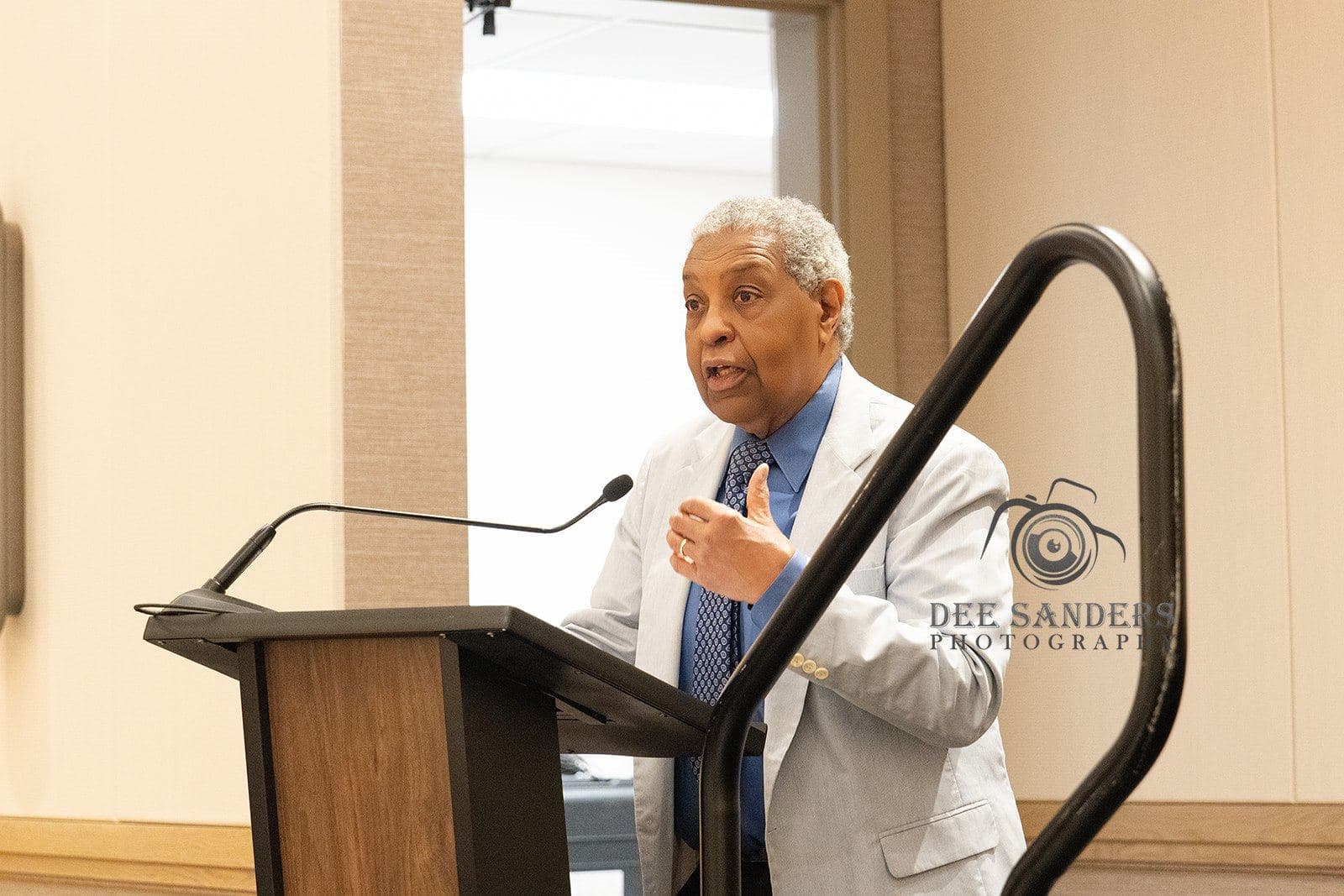 A speaker at the podium during Sunday's program