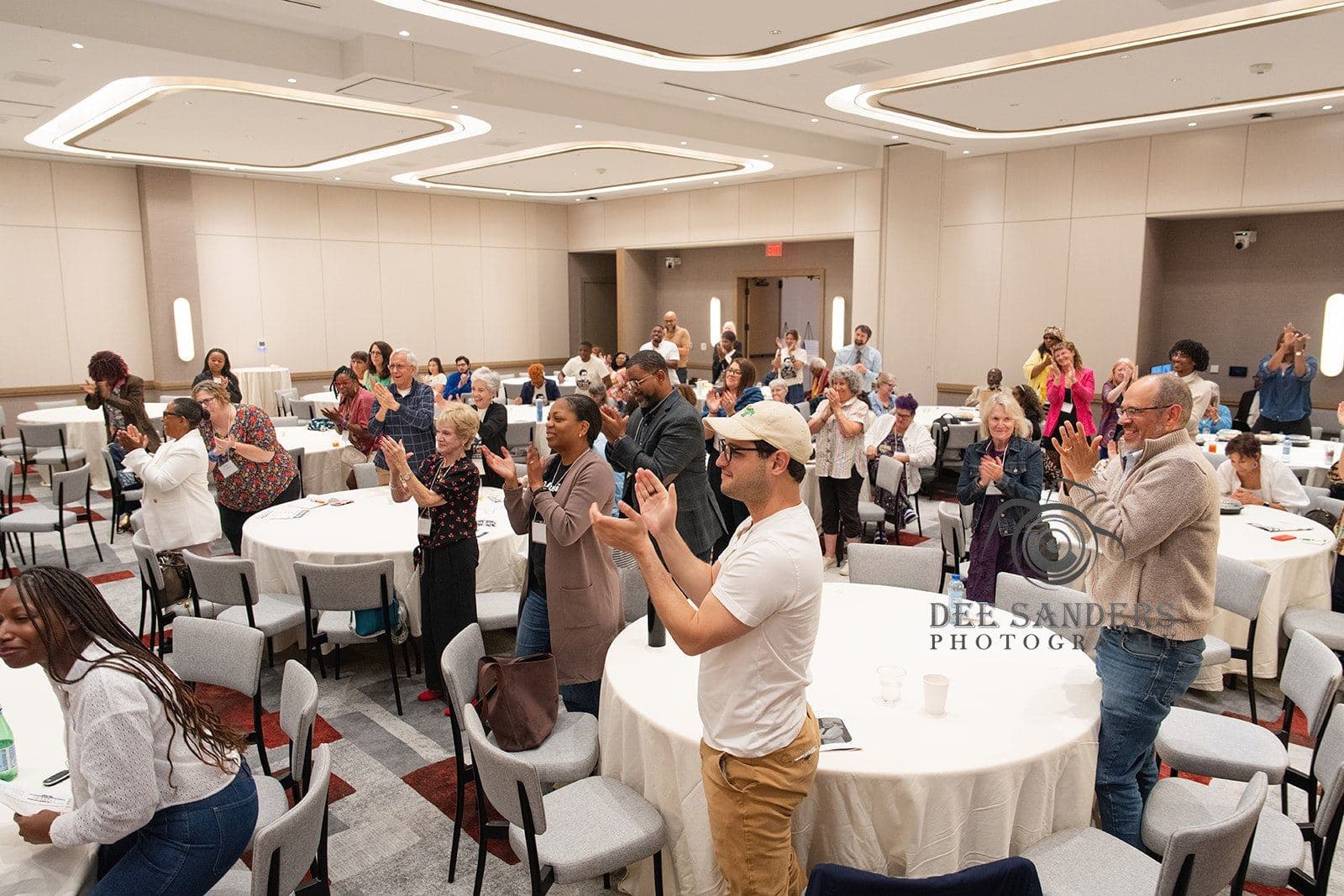The room standing to applaud