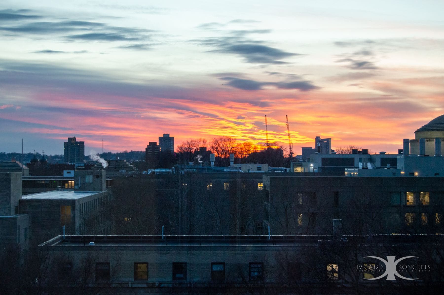 Sunset over the MIT campus rooftops and Great Dome
