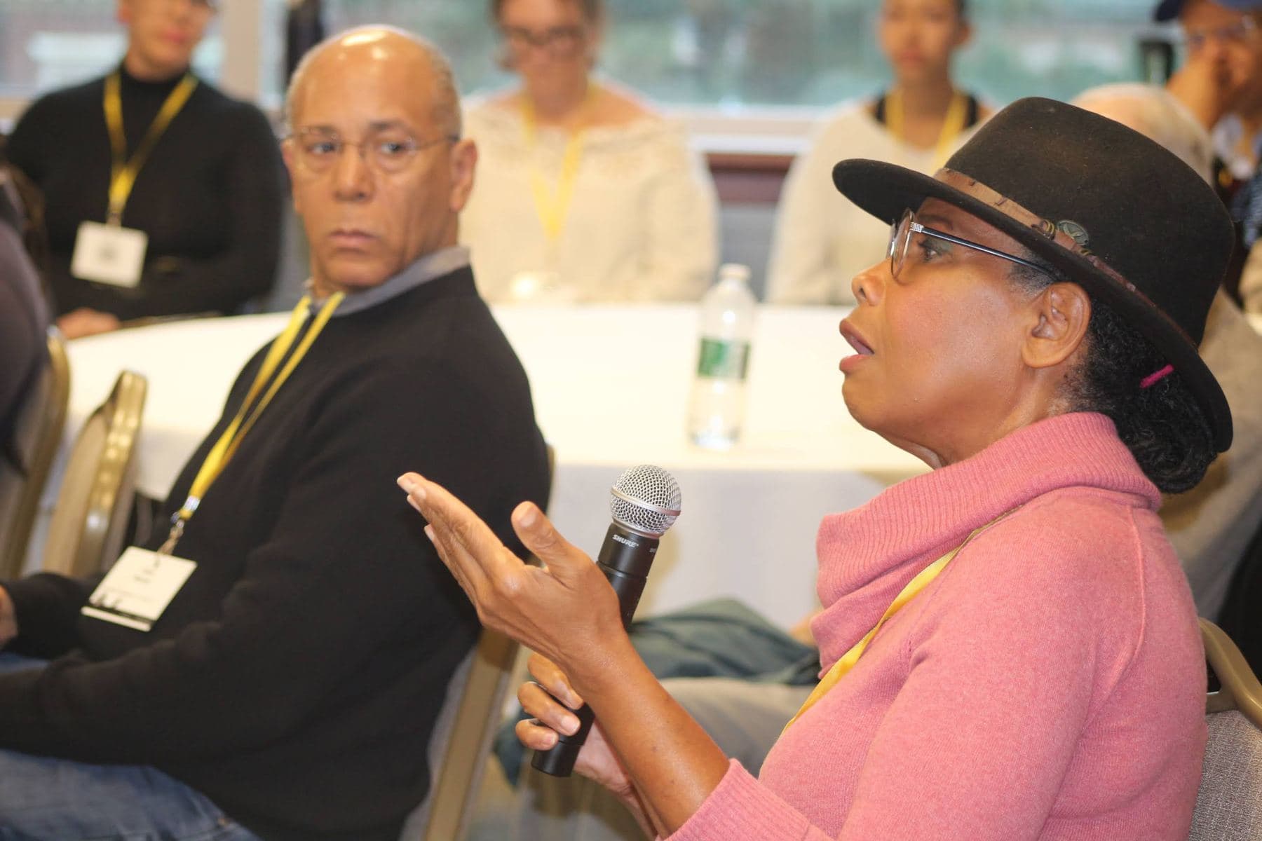 A participant speaking during a breakout discussion