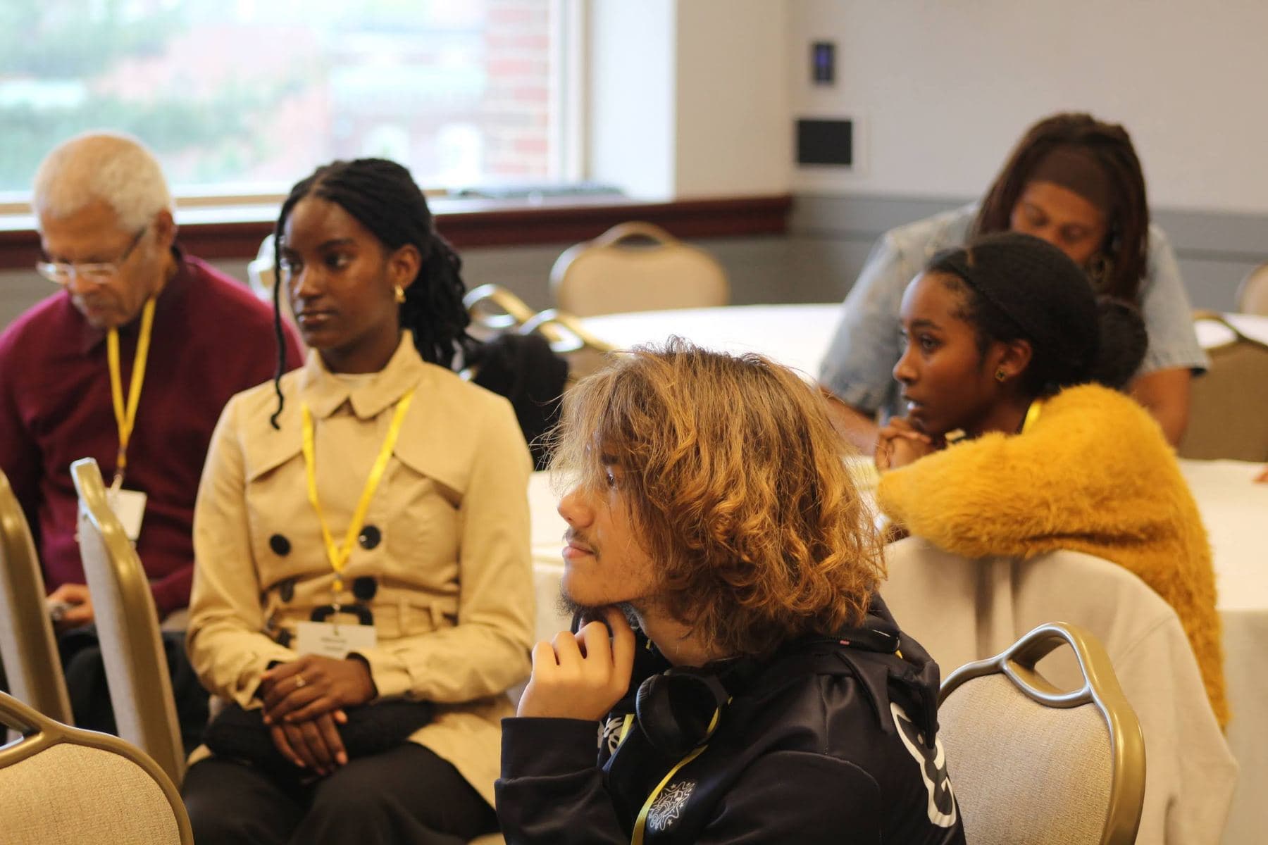 Attendees in conversation