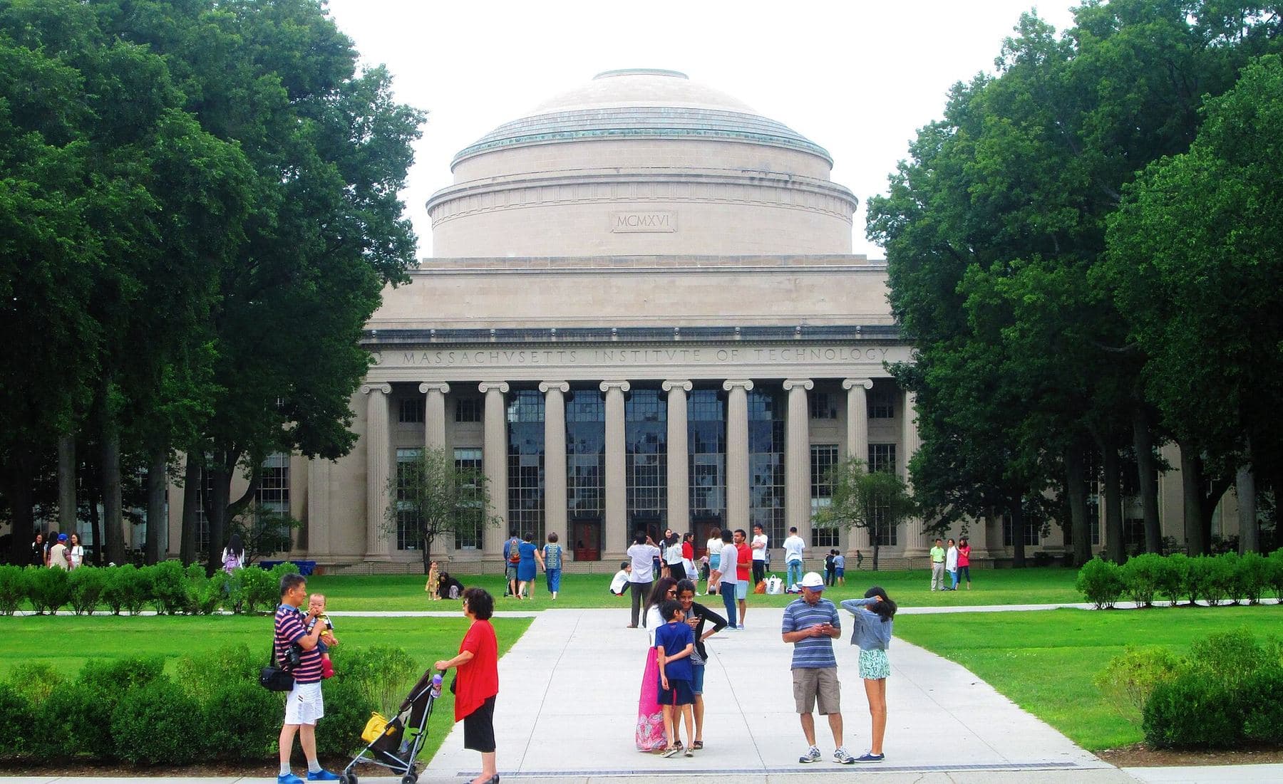 Visitors on the lawn in front of the MIT Great Dome